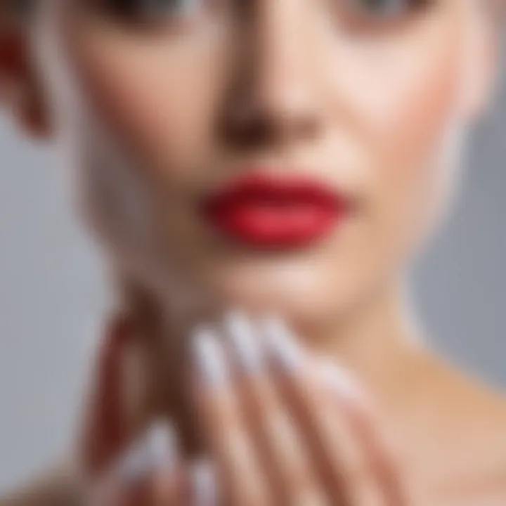 Close-up of a perfect white French nail design.