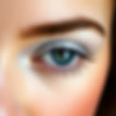 Close-up of a model's eyes with shimmering white eyeshadow applied