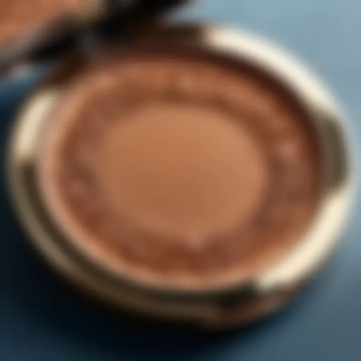 A close-up view of a bronzer compact showcasing its rich texture and color.