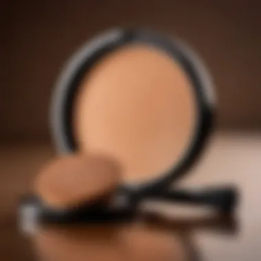 Close-up of a bronzer compact with a brush beside it.