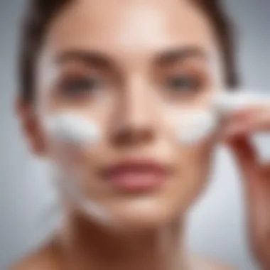 A person applying moisturizer with a focus on facial care