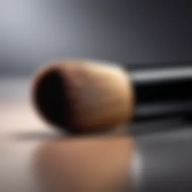 A close-up of a highlighter product with a brush