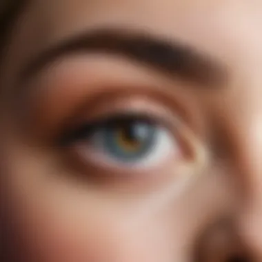 Close-up of a gentle makeup application technique highlighting the eyes.