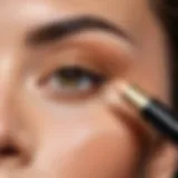 Close-up of a concealer tube with a fine applicator