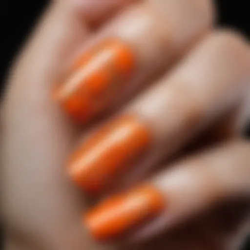 Elegant orange nail art design featuring intricate patterns