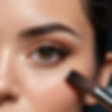 Close-up of a brush applying eyebrow dye with precision.