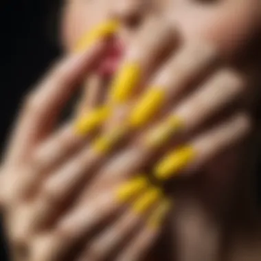 Elegant matte yellow nails with gold detailing