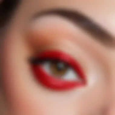 Dramatic Cat Eye with Classic Red Lip Dramatic cat-eye makeup accentuating a classic red lip color