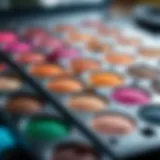 A close-up view of an artist's palette with vibrant eye shadow colors