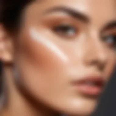 Close-up of a woman applying light foundation for a flawless look