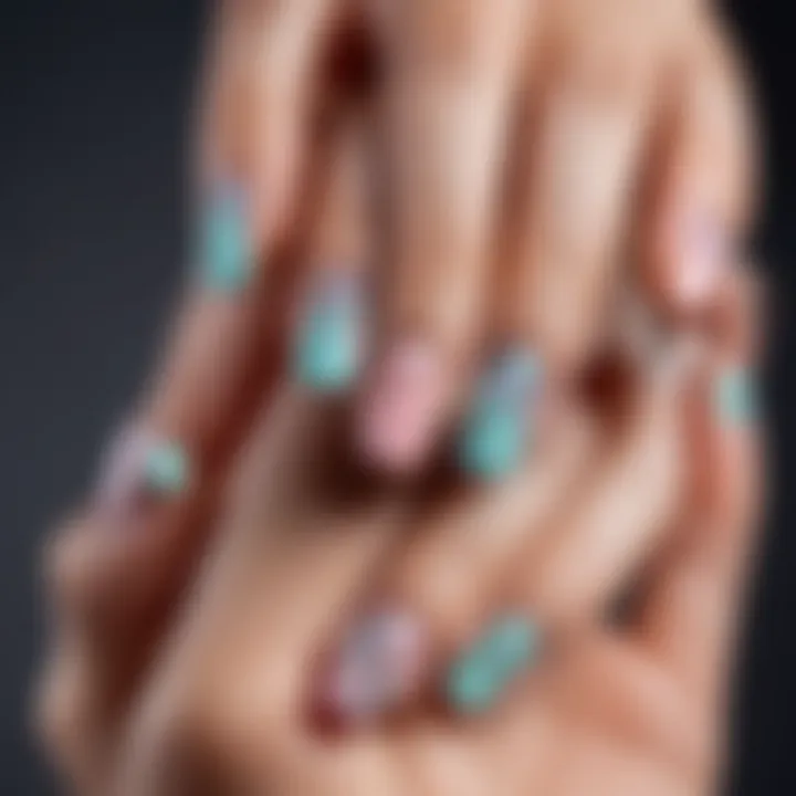 Stylish French nail design incorporating geometric patterns and pastels.