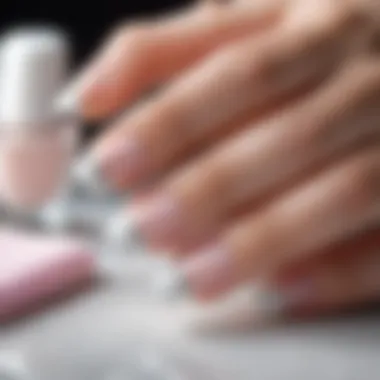 Perfectly painted tips showcasing French manicure technique