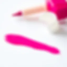 Vibrant fuchsia nail polish swatch on a pristine white surface