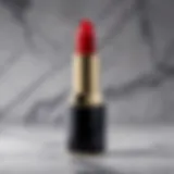 Luxurious velvet red lipstick on a marble surface