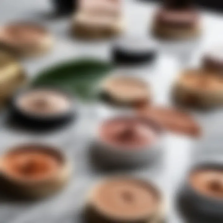 A close-up of natural and organic makeup alternatives on a marble surface.