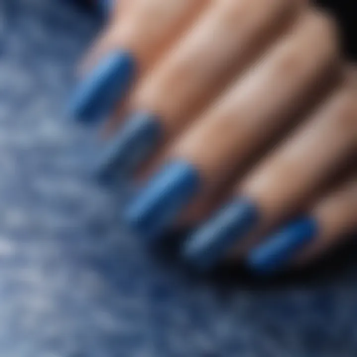 Elegant blue nail art design showcasing intricate patterns