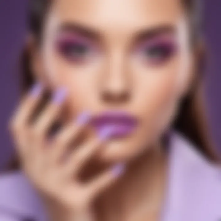 Two shades of nail polish complementing a pastel purple outfit