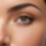 Close-up of beautifully defined eyebrows with microblading technique