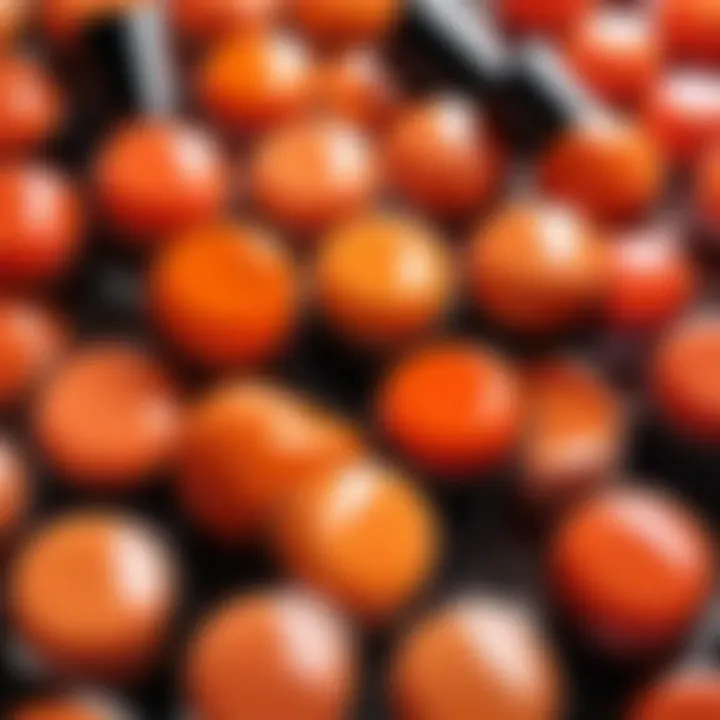 Close-up of different shades of orange nail polish