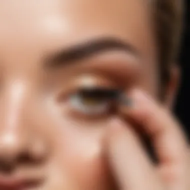 Close-up of a makeup artist applying foundation with precision and care.